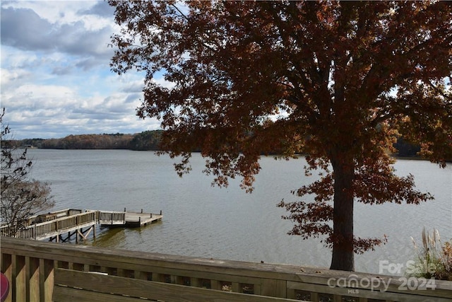 view of dock with a water view