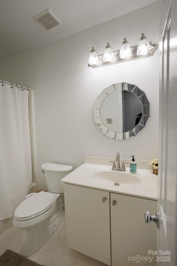 full bathroom with a shower with curtain, visible vents, toilet, vanity, and tile patterned flooring