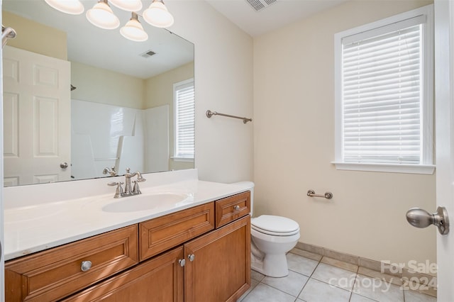 bathroom featuring walk in shower, an inviting chandelier, tile patterned flooring, toilet, and vanity