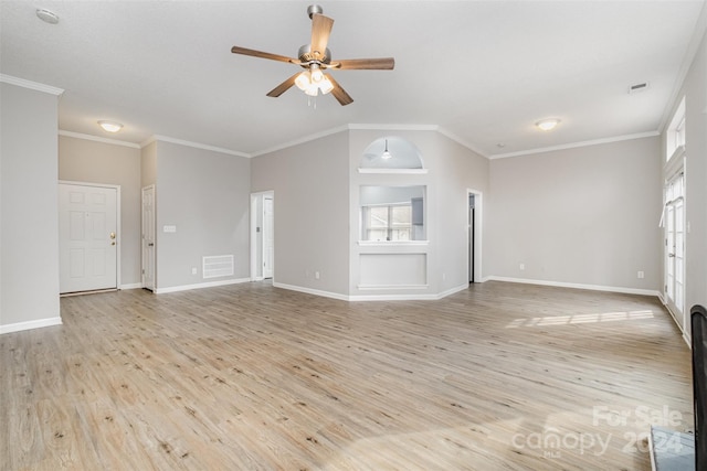 unfurnished living room with light hardwood / wood-style flooring, plenty of natural light, and ornamental molding