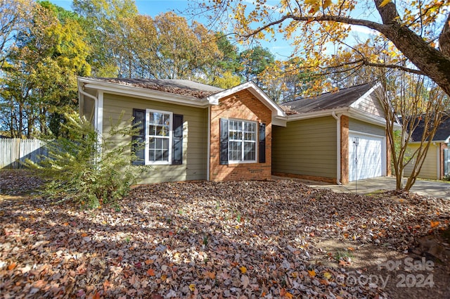 view of side of property featuring a garage