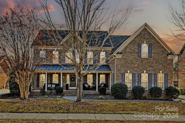 view of front facade featuring covered porch