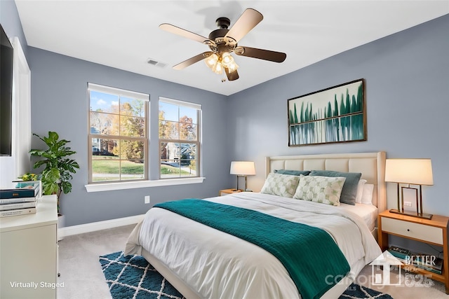 carpeted bedroom featuring ceiling fan