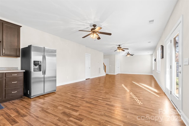 unfurnished living room featuring light wood-type flooring