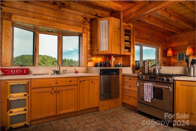 kitchen featuring beamed ceiling, sink, wood ceiling, and stainless steel appliances