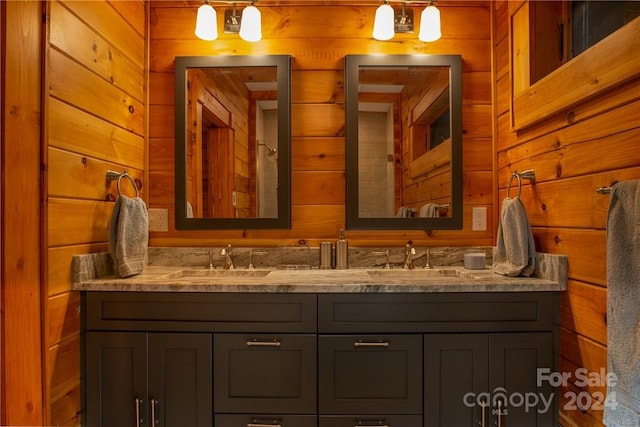 bathroom with wooden walls and vanity