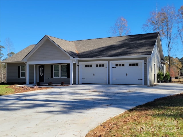 single story home featuring a garage