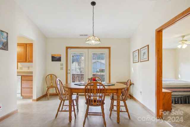 dining space featuring ceiling fan