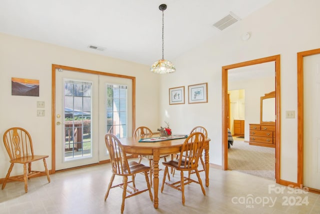 dining room with a chandelier