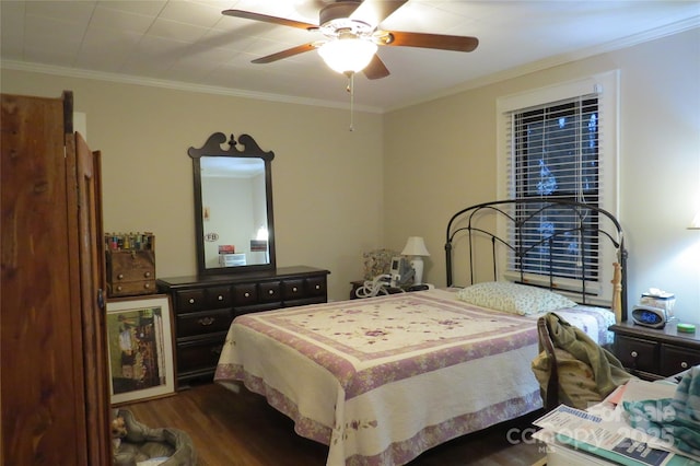 bedroom featuring crown molding, ceiling fan, and wood finished floors