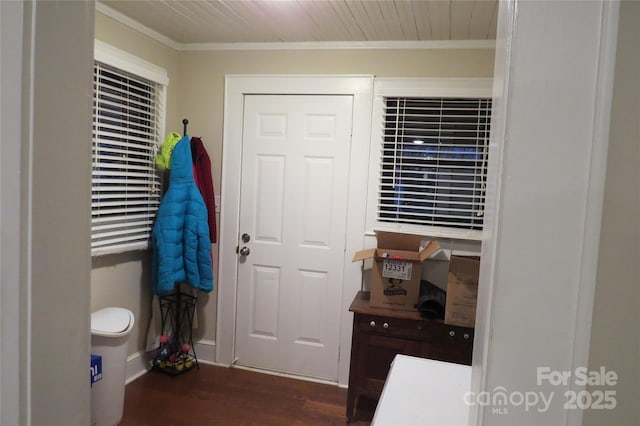 entryway with crown molding and wood finished floors