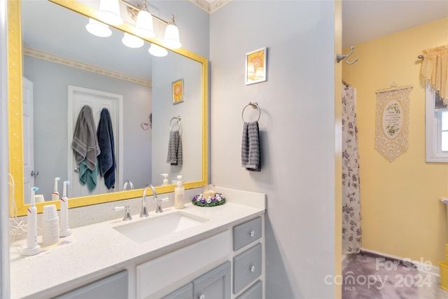 bathroom with vanity and walk in shower