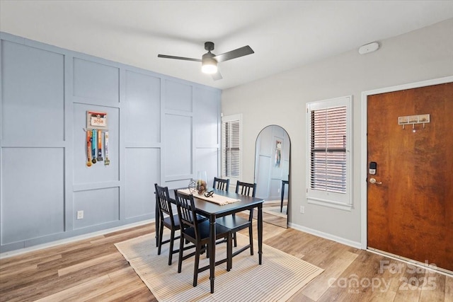 dining room featuring ceiling fan and light hardwood / wood-style floors