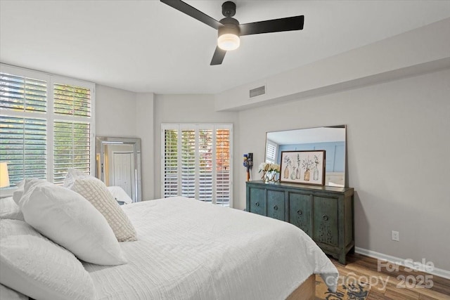 bedroom featuring ceiling fan and wood-type flooring