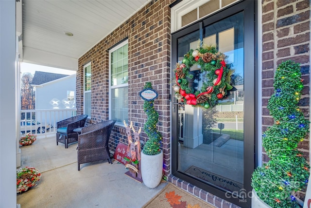 entrance to property with a porch