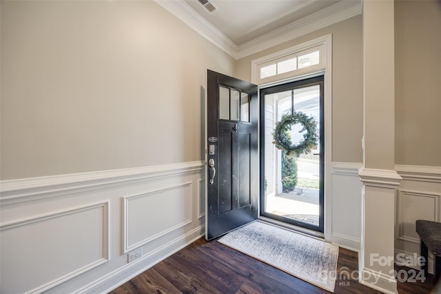 entryway with crown molding and dark wood-type flooring