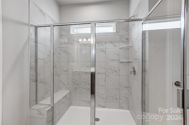 bathroom featuring walk in shower