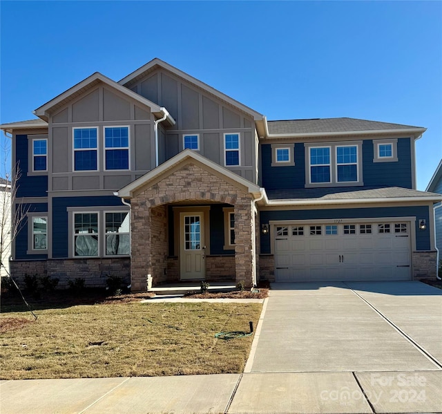 view of front of property featuring a garage