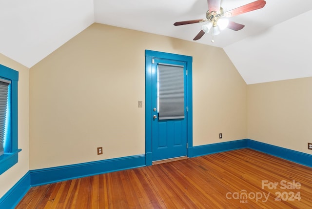 bonus room featuring hardwood / wood-style flooring, ceiling fan, and lofted ceiling