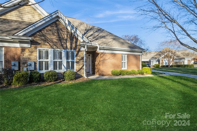 view of front property with a front yard