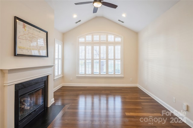 unfurnished living room with ceiling fan, dark hardwood / wood-style flooring, and lofted ceiling