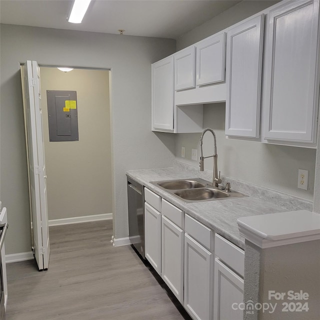 kitchen with white cabinetry, dishwasher, sink, electric panel, and light wood-type flooring