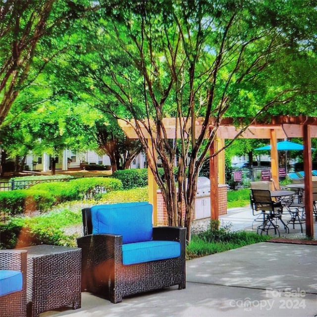 view of patio / terrace featuring a pergola