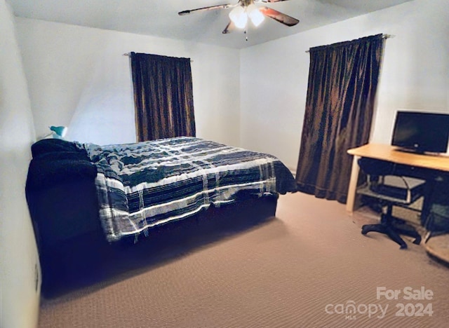 carpeted bedroom with ceiling fan