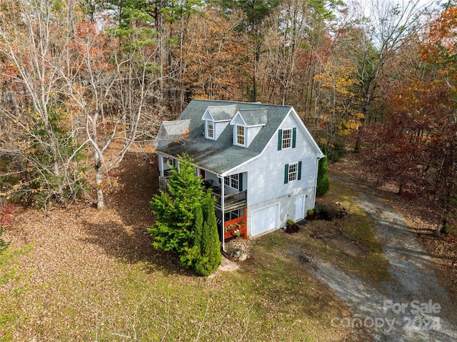 view of property exterior featuring a garage