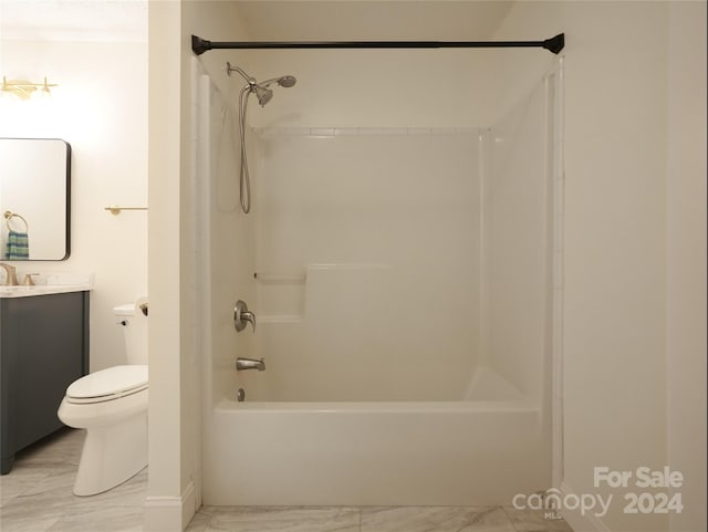 full bathroom featuring shower / washtub combination, vanity, and toilet