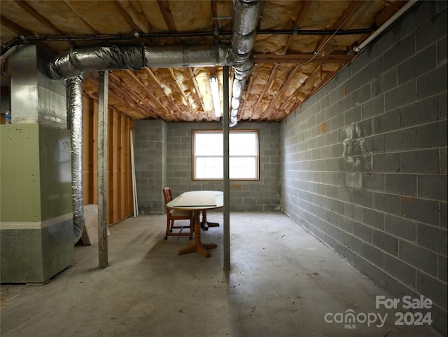 basement featuring heating unit