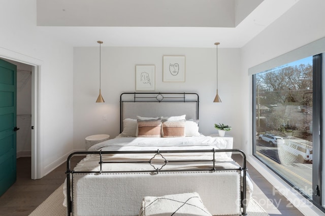 bedroom with wood-type flooring