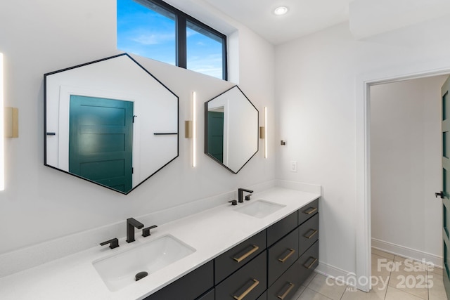 bathroom featuring vanity and tile patterned flooring