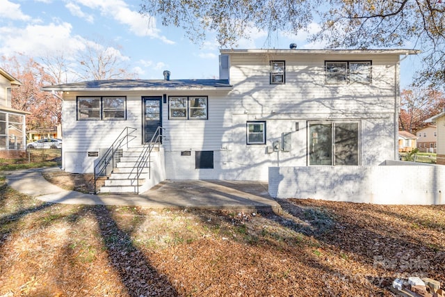 rear view of property with a patio