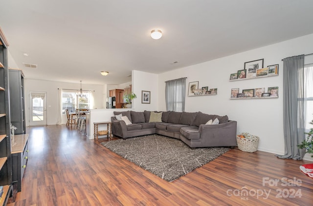 living room featuring dark wood-type flooring