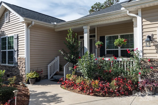 entrance to property with a porch