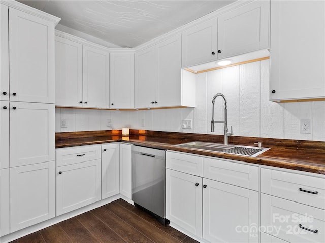 kitchen featuring white cabinets, sink, stainless steel dishwasher, dark hardwood / wood-style floors, and butcher block countertops