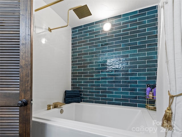 bathroom with shower / tub combo with curtain