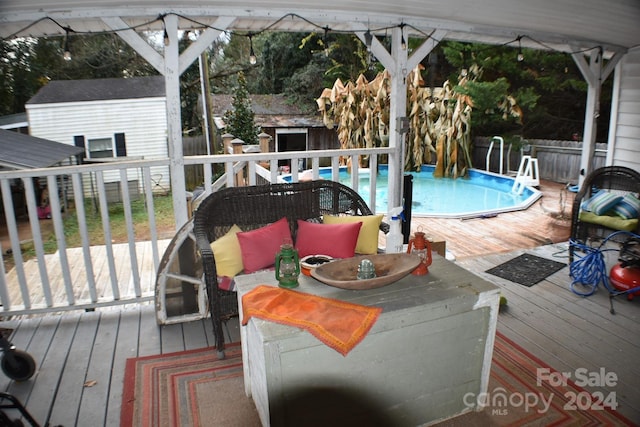 306 Mcadenville Rd, Lowell, NC 28098 - wooden deck featuring a storage shed