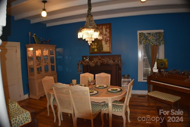 306 Mcadenville Rd, Lowell, NC 28098 - dining area with a chandelier, beamed ceiling, and wood finished floors