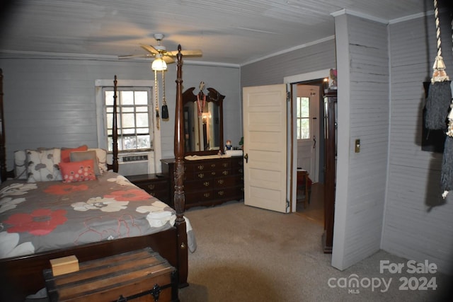 bedroom featuring ceiling fan, cooling unit, light colored carpet, and ornamental molding