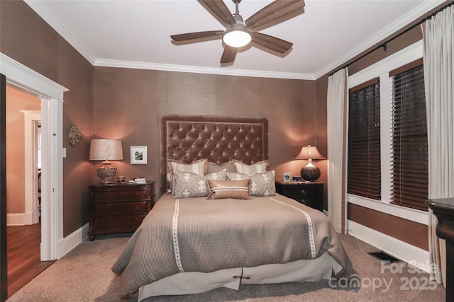 bedroom featuring ceiling fan, carpet, and ornamental molding