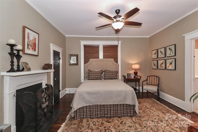 bedroom with ceiling fan, dark hardwood / wood-style floors, and ornamental molding