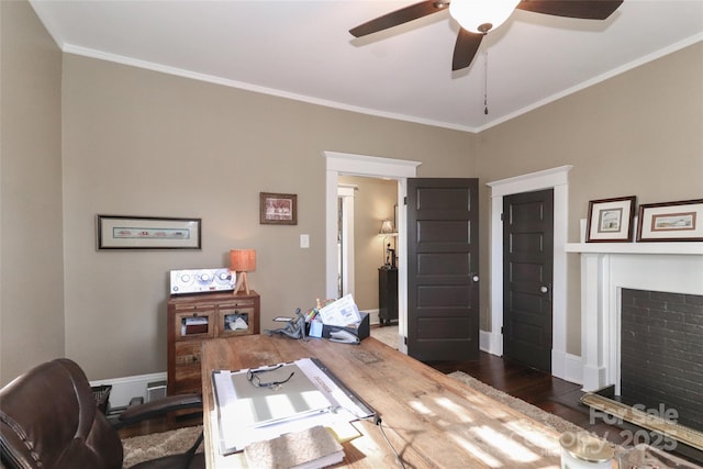 office area with crown molding and dark wood-type flooring