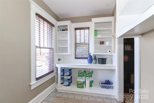 kitchen with light tile patterned floors