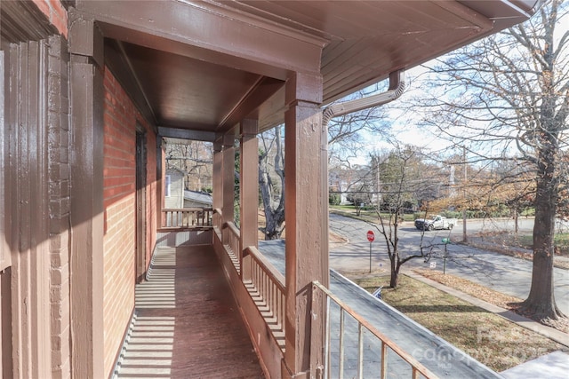 balcony featuring covered porch