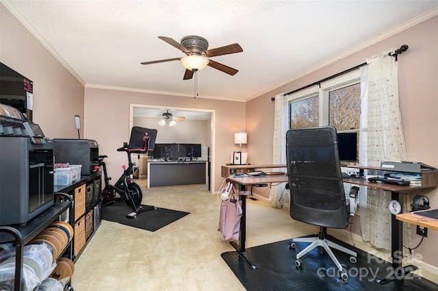 office area with a textured ceiling, light colored carpet, ceiling fan, and crown molding