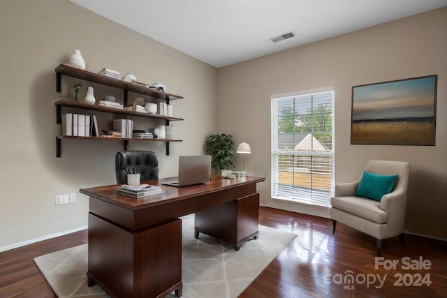 office with dark wood-type flooring