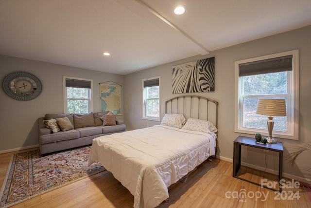 bedroom with light wood-type flooring