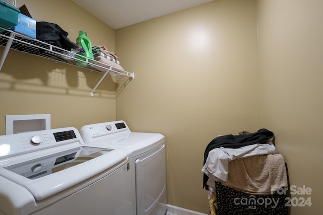 laundry area featuring washer and clothes dryer